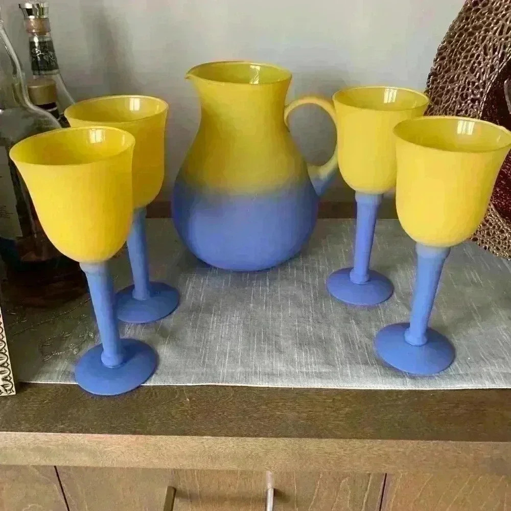 Frosted primary goblets with  pitcher. Made of glass